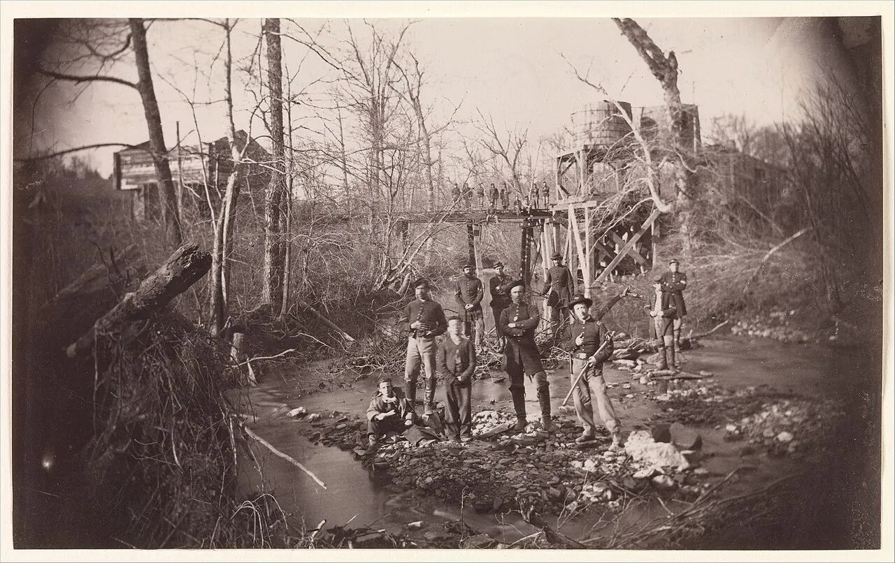 [Soldiers in Creek, Below Orange and Alexandria Rail Road Bridge Across Bull Run, Virginia] by Andrew Joseph Russell