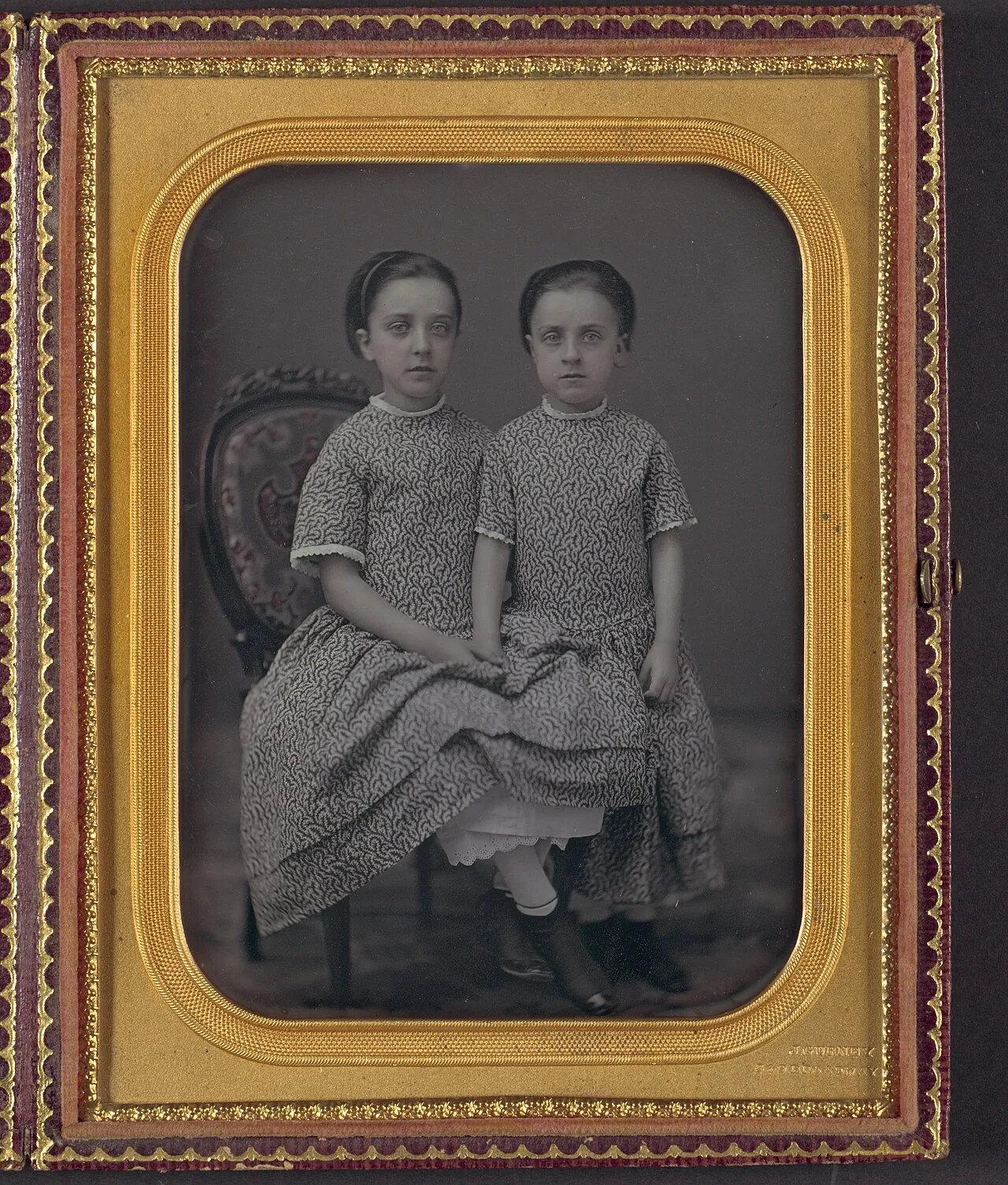 [Two Girls in Identical Dresses] by Jeremiah Gurney