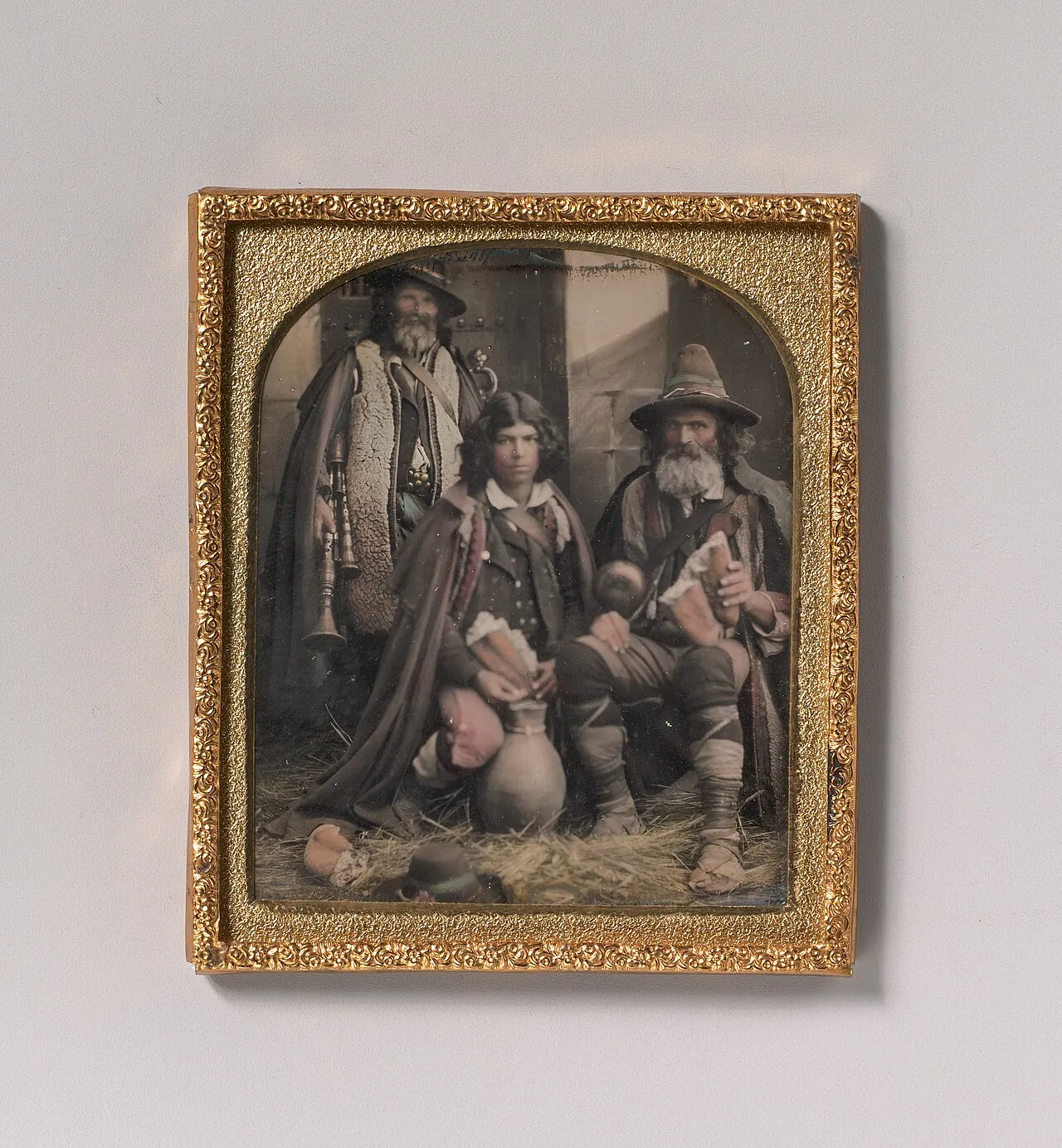 [Three Men in Shepherd Attire, One with Bagpipes, the Other Two Holding Bread] by Unknown